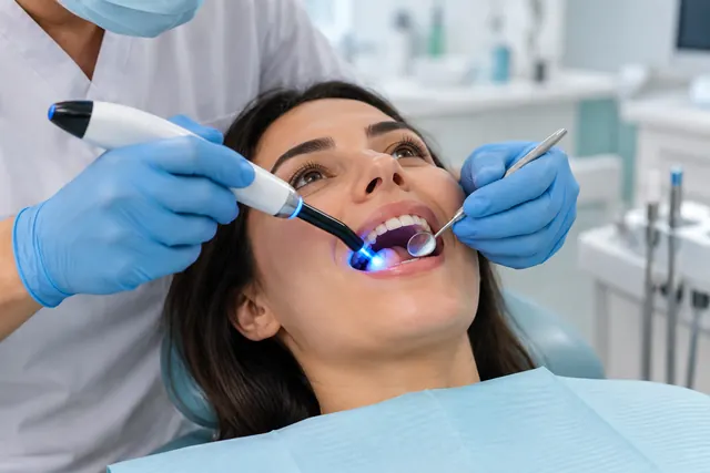 Illustrative image of a dental curing light during a filling appointment